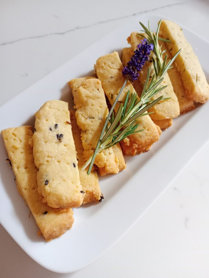 Rosemary and lavender shortbread on white serving plate